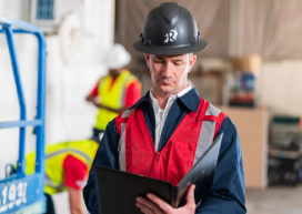 A service professional prepares for trauma cleanup.