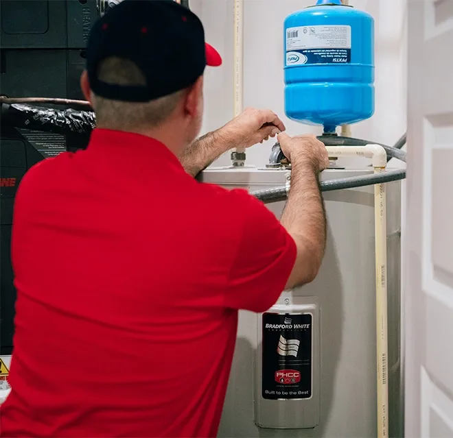 Rainbow Restoration’s emergency response team carries equipment for a water damage loss in Madras, OR.