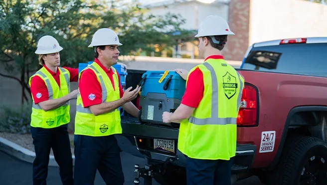 Rainbow Restoration’s emergency response team unloads equipment at a property damage loss in Rainbow City, AL.