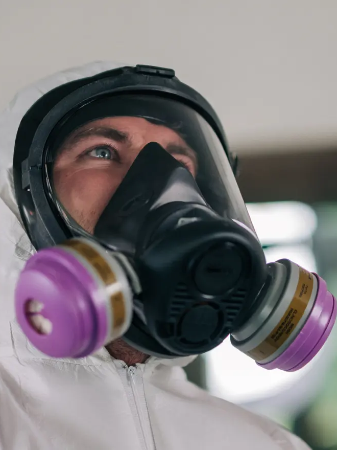 A Rainbow Restoration service professional inspects a home during sewage cleanup services.