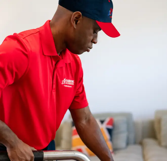 The worker performing damage restoration services.