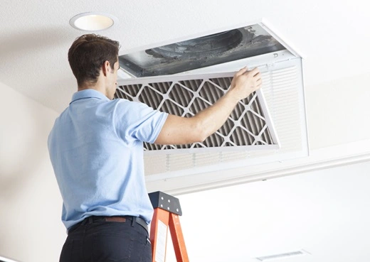 Rainbow Restoration service professional cleaning residential air ducts.