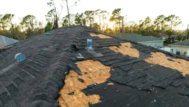 Severe roof damage from a tornado.