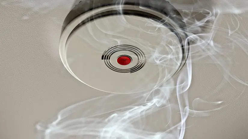 Smoke detector with wisps of smoke