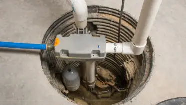 Sump pump in a basement.